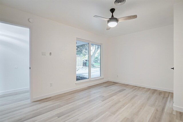 7226 Troulon Dr, Houston, TX 77074 - unfurnished room with light wood-style floors, a ceiling fan, and a smoke detector