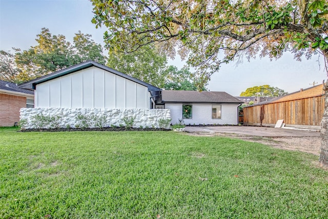7226 Troulon Dr, Houston, TX 77074 - back of house with board and batten siding
