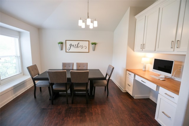 6926 Glenmoor Dr, Rosharon, TX 77583 - dining area with dark wood-style flooring, built in desk, and a chandelier
