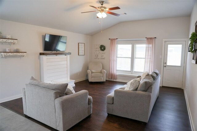 6926 Glenmoor Dr, Rosharon, TX 77583 - living area featuring vaulted ceiling, a ceiling fan, and dark wood-type flooring