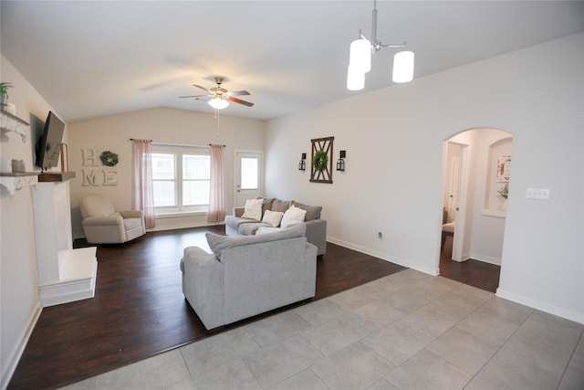 6926 Glenmoor Dr, Rosharon, TX 77583 - living area with arched walkways, ceiling fan, and lofted ceiling