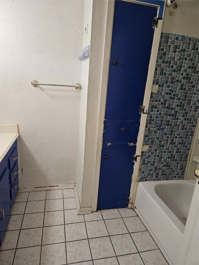 5218 Cortelyou Ln, Houston, TX 77021 - full bathroom featuring tile patterned floors, vanity, and shower / bath combination