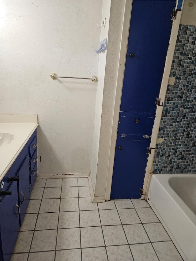 5218 Cortelyou Ln, Houston, TX 77021 - full bath with tile patterned floors, vanity, and bathtub / shower combination