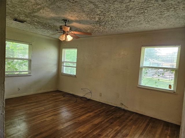 5218 Cortelyou Ln, Houston, TX 77021 - unfurnished room with hardwood / wood-style floors, ceiling fan, crown molding, and a textured ceiling