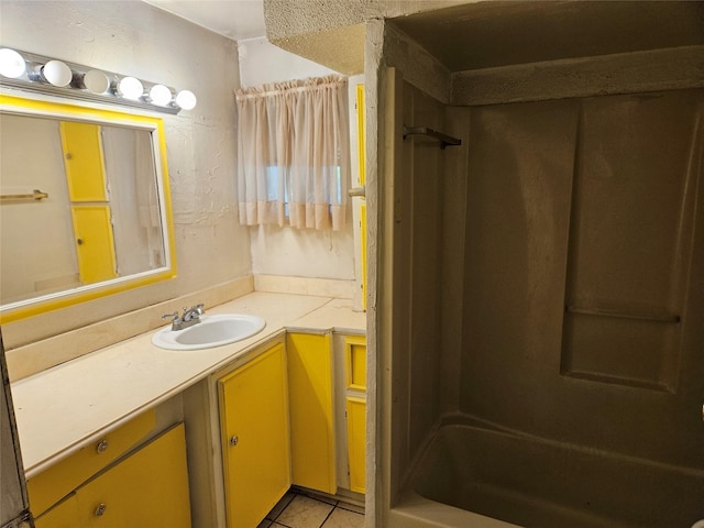 5218 Cortelyou Ln, Houston, TX 77021 - full bath featuring vanity, tile patterned floors, and shower / bath combination