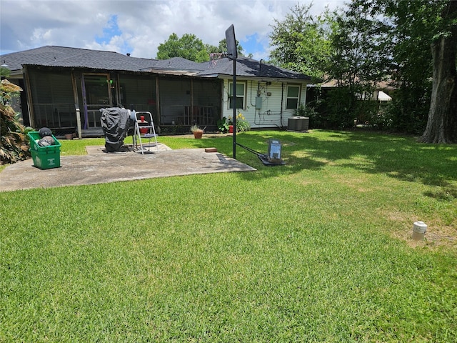 5218 Cortelyou Ln, Houston, TX 77021 - back of house with a patio area, a yard, and roof with shingles