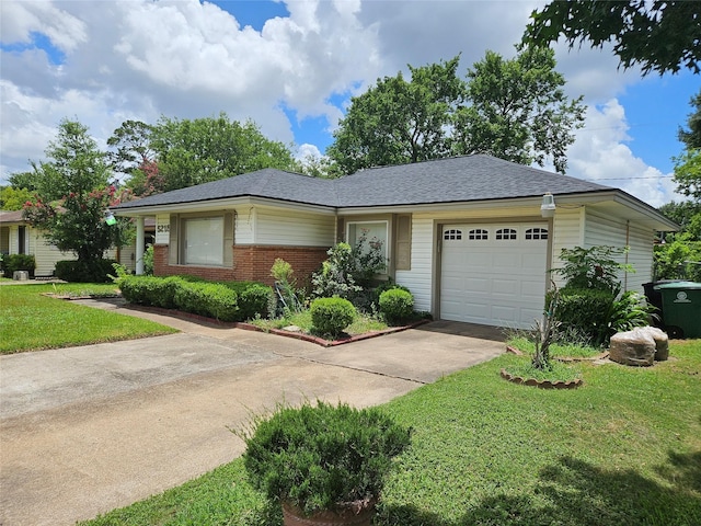 5218 Cortelyou Ln, Houston, TX 77021 - ranch-style home with concrete driveway, an attached garage, a front yard, brick siding, and a shingled roof