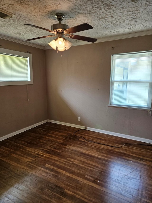 5218 Cortelyou Ln, Houston, TX 77021 - spare room with healthy amount of natural light, hardwood / wood-style floors, ornamental molding, a textured ceiling, and a ceiling fan