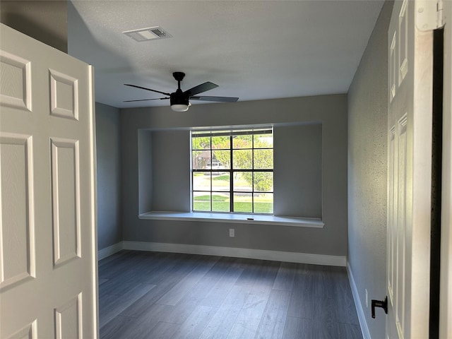 2922 Field Line Dr, Sugar Land, TX 77479 - unfurnished room with dark wood finished floors and a ceiling fan