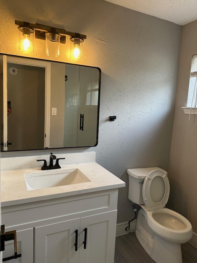2922 Field Line Dr, Sugar Land, TX 77479 - bathroom featuring vanity and wood finished floors
