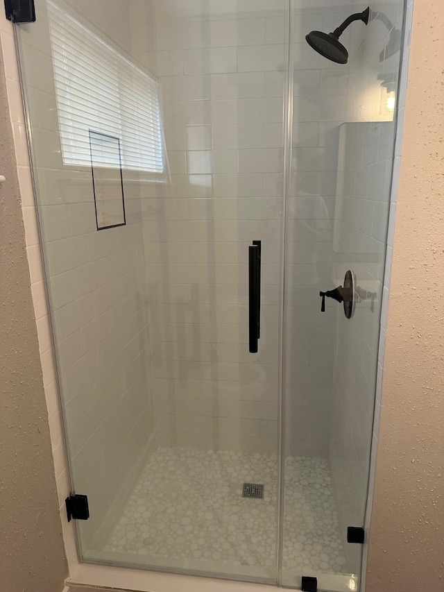 2922 Field Line Dr, Sugar Land, TX 77479 - full bath with a shower stall and a textured wall