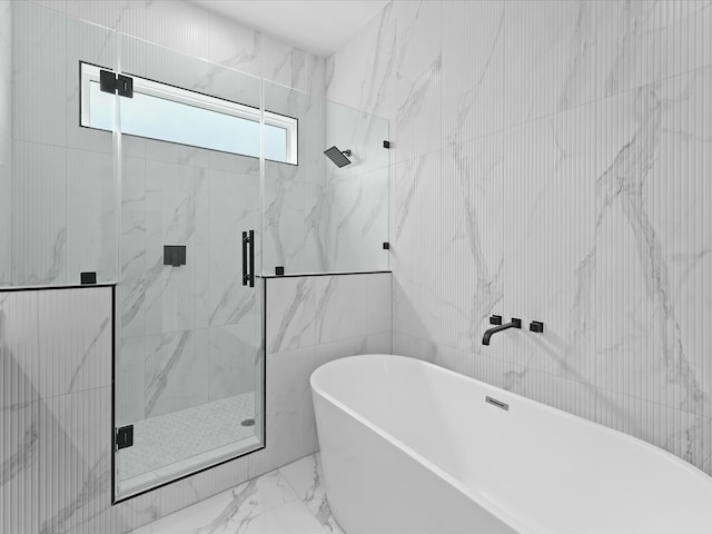 1264 Finnigan St, Houston, TX 77020 - full bathroom featuring marble finish floors, a freestanding bath, and a marble finish shower