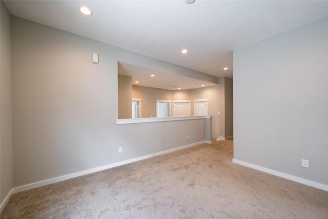 11325 Stonework Garden Ln, Houston, TX 77076 - unfurnished living room featuring carpet flooring and recessed lighting
