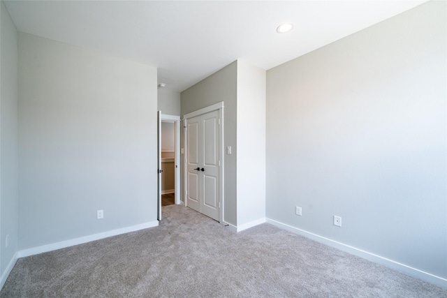 11325 Stonework Garden Ln, Houston, TX 77076 - carpeted spare room with baseboards and recessed lighting