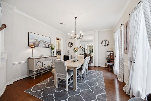 1155 Rustling Wind Ln, League City, TX 77573 - dining room featuring a chandelier, dark wood-style floors, and crown molding