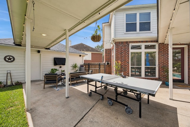 1155 Rustling Wind Ln, League City, TX 77573 - view of patio / terrace with an outdoor living space and outdoor dining space