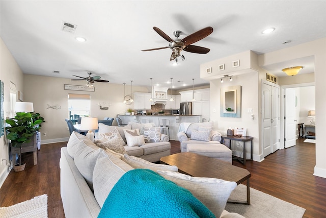 862 Gregory Ln, Port Bolivar, TX 77650 - living area featuring a ceiling fan, dark wood-type flooring, and recessed lighting