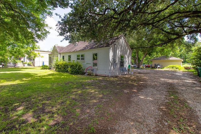 714 E Rogers St, Houston, TX 77022 - back of property with a lawn
