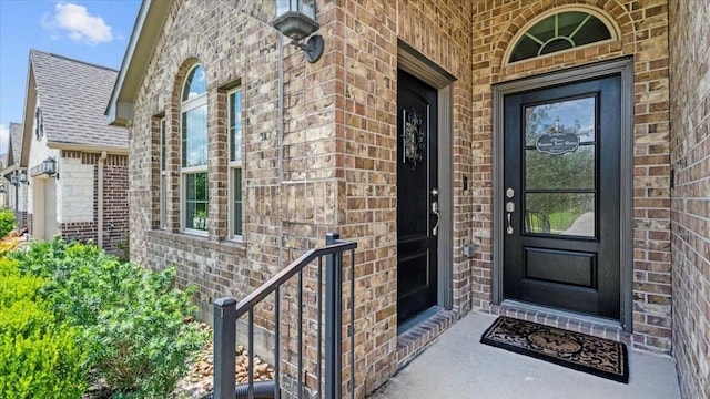 4542 Shallow Ember Dr, Spring, TX 77386 - entrance to property featuring brick siding and roof with shingles