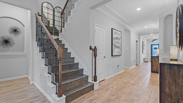 4542 Shallow Ember Dr, Spring, TX 77386 - stairs with ornamental molding, wood finished floors, and recessed lighting