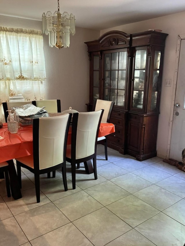9213 Old Clydesdale Dr, Fort Worth, TX 76123 - dining space featuring a chandelier and light tile patterned floors