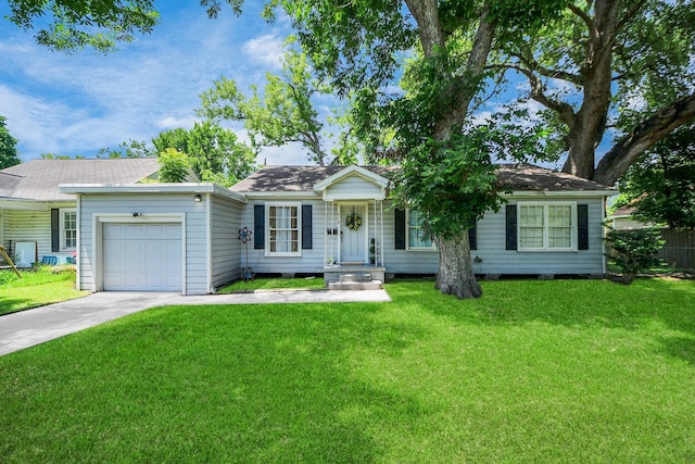 418 Forrest St, Baytown, TX 77520 - single story home with an attached garage, concrete driveway, and a front lawn