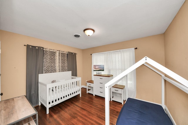 418 Forrest St, Baytown, TX 77520 - bedroom with wood finished floors