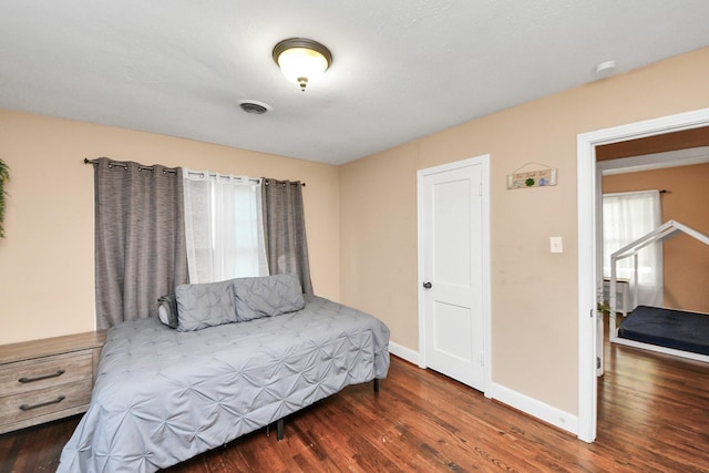 418 Forrest St, Baytown, TX 77520 - bedroom featuring wood finished floors