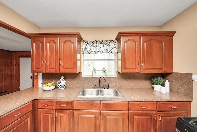 418 Forrest St, Baytown, TX 77520 - kitchen featuring range, light countertops, and brown cabinets