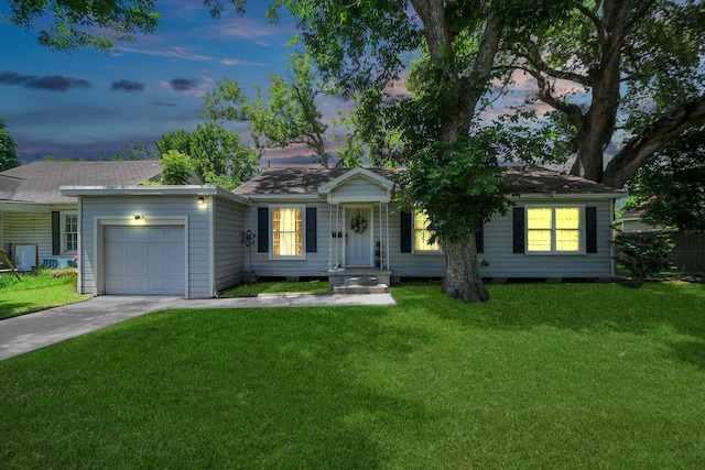 418 Forrest St, Baytown, TX 77520 - ranch-style house with a garage, driveway, and a yard
