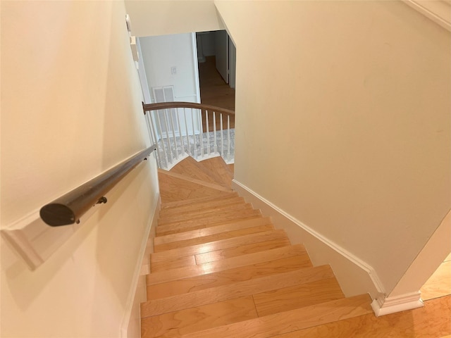 13631 Balmore Cir, Houston, TX 77069 - stairway with baseboards and wood finished floors