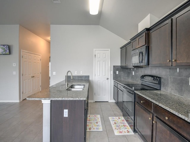 3635 W L Breeding Dr, Corpus Christi, TX 78414 - kitchen featuring black appliances, a peninsula, light tile patterned floors, dark brown cabinets, and tasteful backsplash