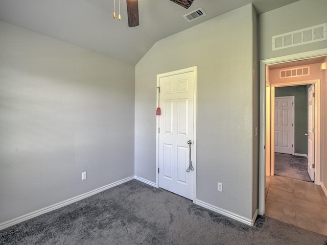 3635 W L Breeding Dr, Corpus Christi, TX 78414 - unfurnished bedroom with carpet flooring, vaulted ceiling, and ceiling fan