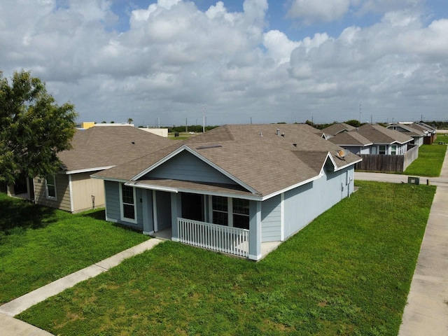 3635 W L Breeding Dr, Corpus Christi, TX 78414 - view of front facade featuring roof with shingles and a residential view