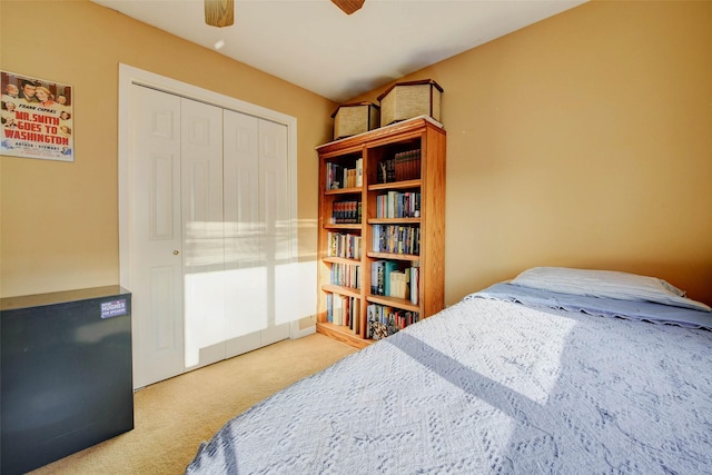 5651 Pine St, Houston, TX 77081 - bedroom with carpet floors, ceiling fan, and a closet