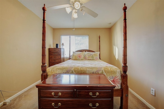 5651 Pine St, Houston, TX 77081 - carpeted bedroom featuring baseboards and a ceiling fan