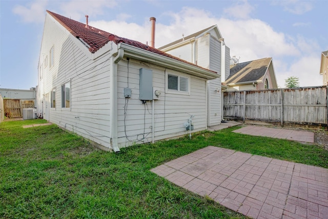 5651 Pine St, Houston, TX 77081 - rear view of house featuring a fenced backyard and a patio area