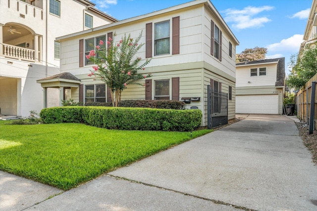 4206 Law St, Houston, TX 77005 - view of front facade with a garage, concrete driveway, and a front yard