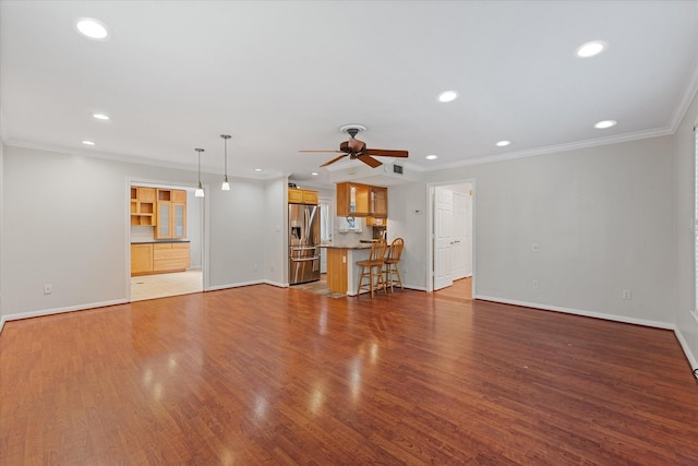 4206 Law St, Houston, TX 77005 - unfurnished living room featuring recessed lighting, a ceiling fan, crown molding, and wood finished floors