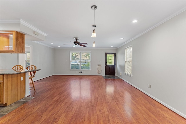 4206 Law St, Houston, TX 77005 - unfurnished living room with wood finished floors, a ceiling fan, recessed lighting, and ornamental molding