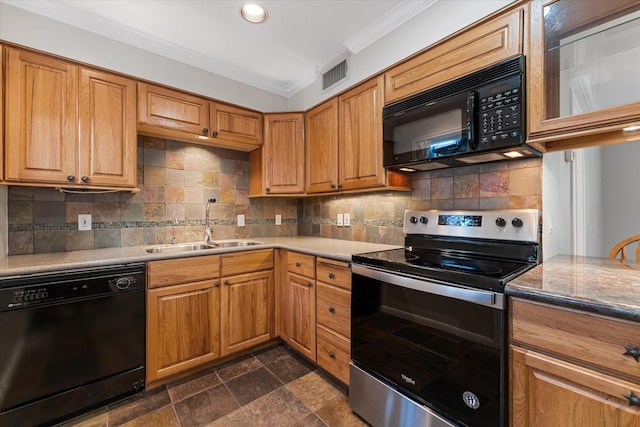 4206 Law St, Houston, TX 77005 - kitchen with black appliances, ornamental molding, tasteful backsplash, brown cabinets, and recessed lighting