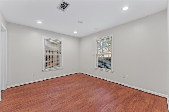 4206 Law St, Houston, TX 77005 - empty room with wood finished floors and recessed lighting