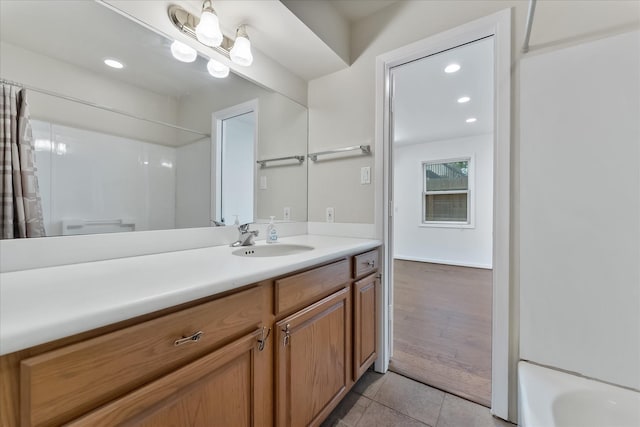 4206 Law St, Houston, TX 77005 - full bath with vanity, tile patterned floors, and recessed lighting
