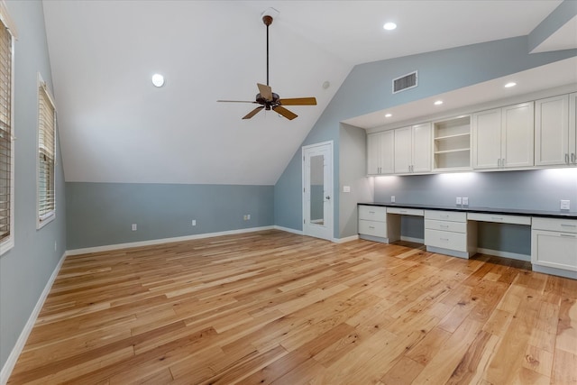 4206 Law St, Houston, TX 77005 - unfurnished office featuring built in desk, vaulted ceiling, light wood-style floors, ceiling fan, and recessed lighting