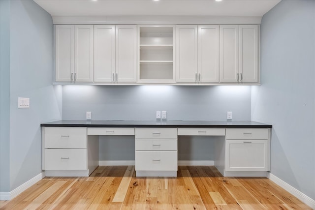 4206 Law St, Houston, TX 77005 - unfurnished office with built in desk and light wood-type flooring