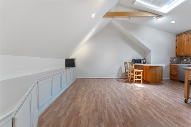 4206 Law St, Houston, TX 77005 - additional living space featuring lofted ceiling, light wood-style flooring, and recessed lighting