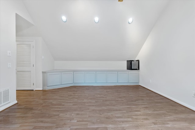 4206 Law St, Houston, TX 77005 - bonus room with vaulted ceiling and light wood-style floors