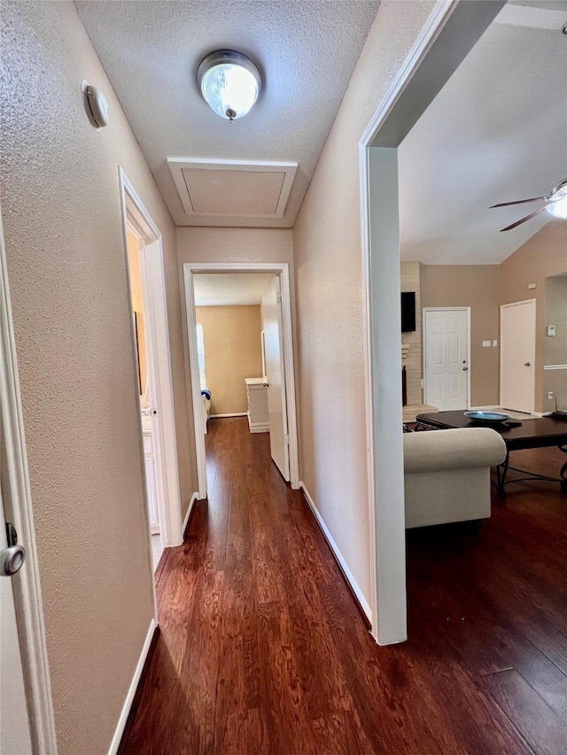 18738 Shannon Glen Ln, Houston, TX 77084 - corridor featuring wood finished floors and a textured ceiling