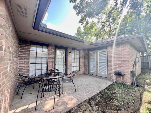 18738 Shannon Glen Ln, Houston, TX 77084 - view of patio featuring french doors