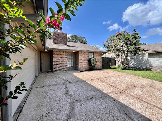 18738 Shannon Glen Ln, Houston, TX 77084 - view of patio / terrace with driveway
